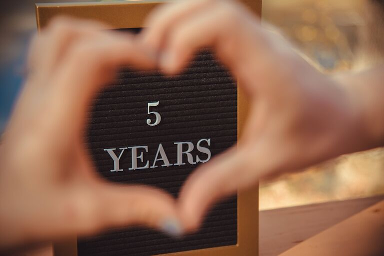 5 years written in a heart-shape